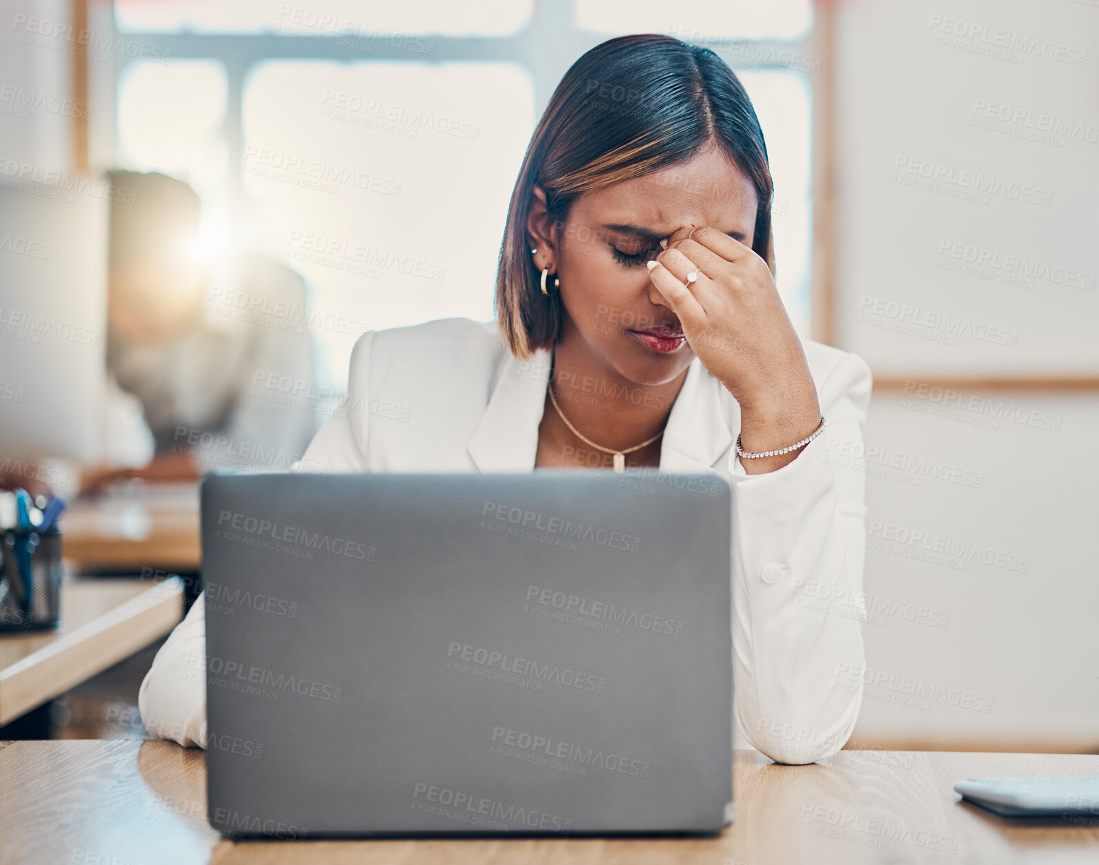 Buy stock photo Stress, laptop and headache with a woman tax compliance officer struggling with burnout while working on a report or audit. Mental health, regulations and risk with a female employee making a mistake