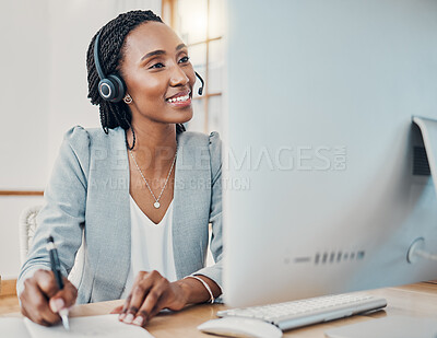 Buy stock photo Headset, call center and black woman use computer working at desk in office or work online from home. Smile, female consultant or happy worker in telemarketing and make meeting notes