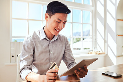 Buy stock photo Business, asian and online shopping man with tablet satisfied with payment using credit card. Happy corporate worker with smile in Hong Kong company enjoying ecommerce break at table in office.