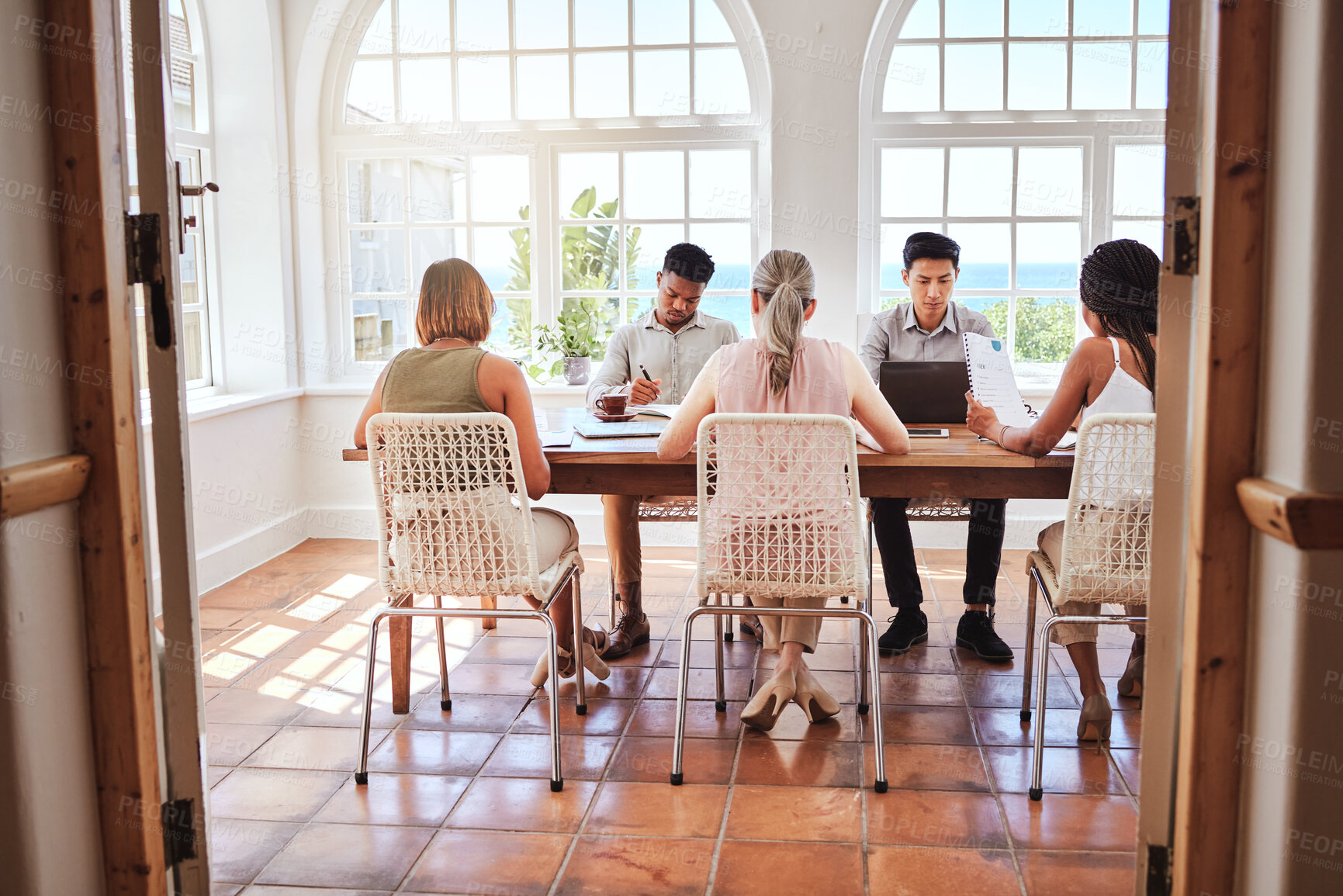 Buy stock photo Business people, startup and diversity team in marketing busy at work sitting in modern office. Group of diverse creative employee workers in planning, strategy or company project in conference table