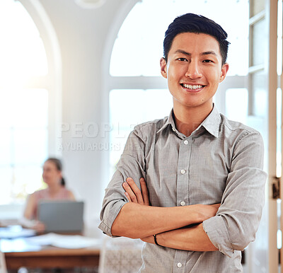 Buy stock photo Asian man, leader and in office stand happy, proud and confident at workplace and with cross arms. Portrait, businessman and entrepreneur focus, positive and smile for successful project in workspace