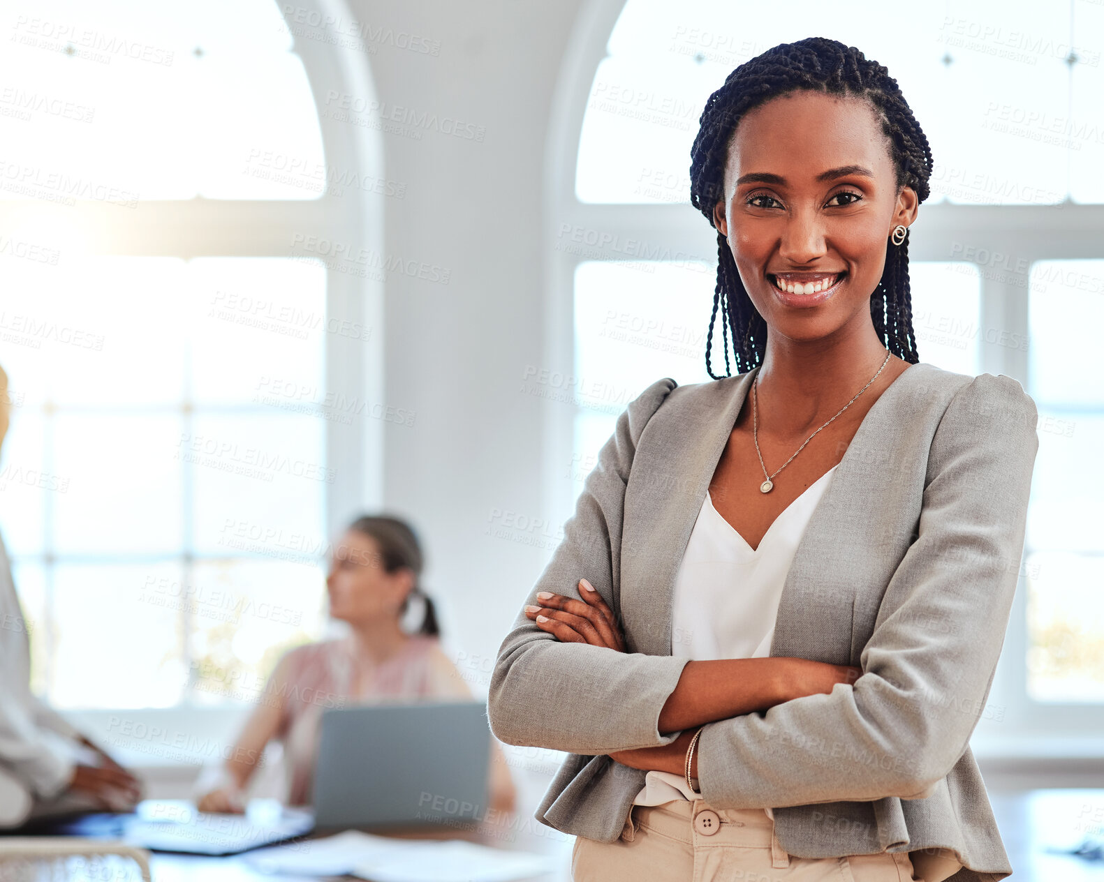 Buy stock photo Black woman, entrepreneur and leader stand in office happy, proud or confident in business, project and with cross arms. Portrait, African American female or smile empowerment in successful workspace