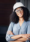 Engineer, technician and black woman with safety helmet, glasses and a smile while working in the construction, architect and engineering industry. Portrait of a happy female worker looking confident