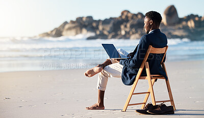 Buy stock photo Beach, work and black man reading an email on a laptop with 5g internet while working by ocean. Relax, smile and happy African businessman doing remote business on a chair at the beach with computer