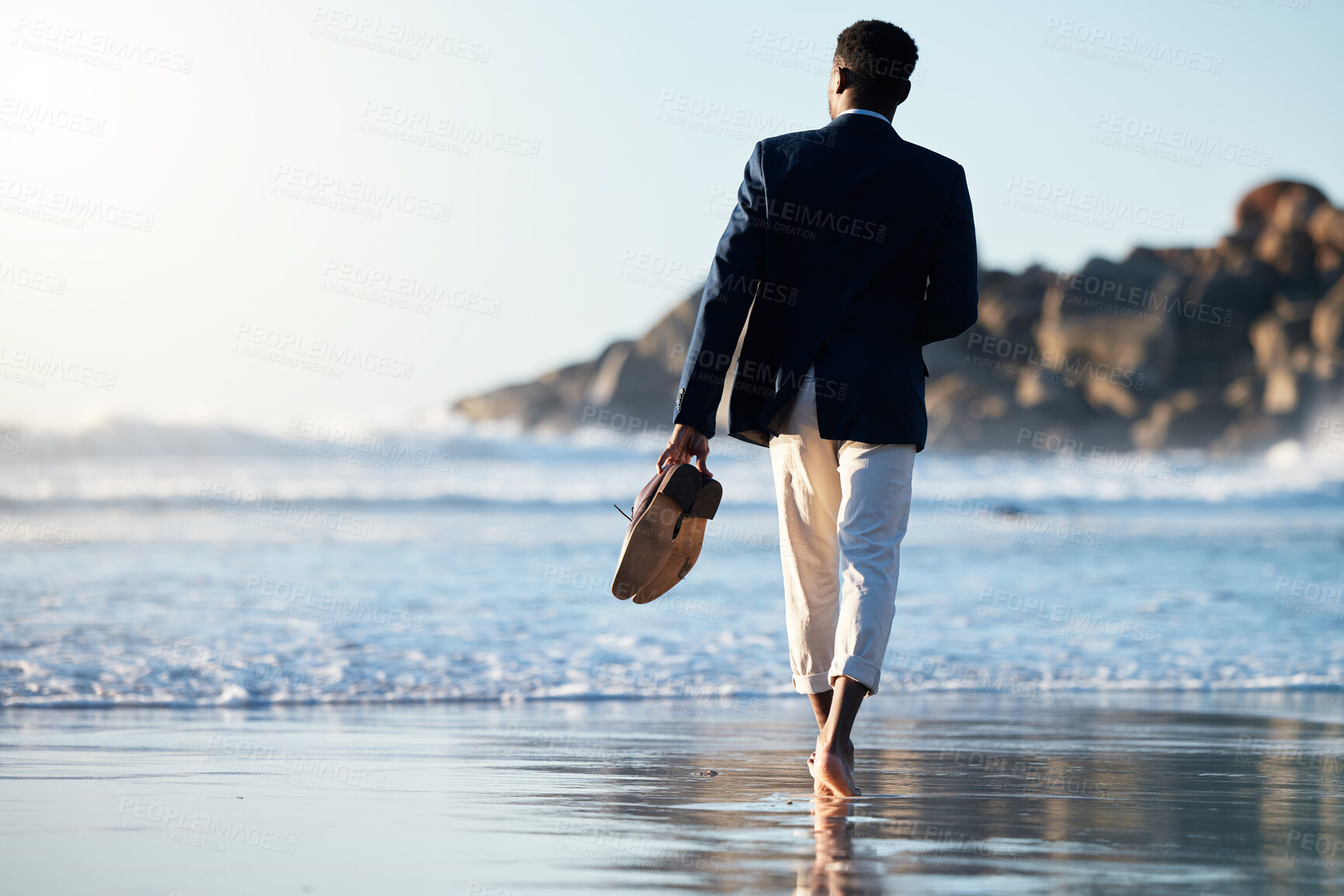 Buy stock photo Business man relax at beach, walking on sand with shoes in hand and calm holiday at California sea. Sunset waves break on weekend, summer travel freedom with zen blue sky and ocean vacation travel