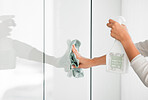 Cleaning window, spray and hands of woman with hygiene cloth and bottle working on domestic house work. Housekeeping service cleaner, liquid soap and girl with chemical detergent for home glass wall