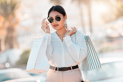 Buy stock photo Shopping, fashion and city woman with bag walk on street road after buying luxury designer clothes on sales discount. Rich, wealth or chic customer travel in Toronto Canada after retail therapy spree