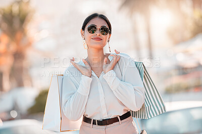 Buy stock photo Shopping, wealth and woman on smile for fashion discount, promotion and sales deal in retail market. Freedom, smile and customer or latino female walking with bags of clothes outdoor in Paris, France