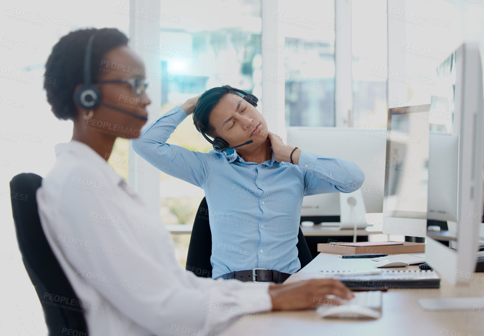 Buy stock photo Call center, businessman and neck pain, stress and injury at office desk in sales agency. Worker burnout, joint pain problem and young asian consultant stretching body posture, health risk or anxiety