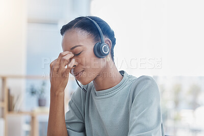 Buy stock photo Stress, burnout and sad call center worker with a headache and office anxiety sitting in an office. Frustrated, sick or depression black woman customer service employee with pain or mental health
