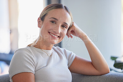 Buy stock photo Face portrait of happy, smiling and content woman on sofa in living room in home, relax with smile on couch in lounge. Happy, smile and beauty female in house on the weekend enjoy leisure break 