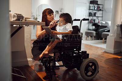 Buy stock photo Hair, beauty and inclusive barber grooming child in a wheelchair, relax while digital tablet and comfort. Care, disability and child development with handicapped boy enjoying pamer treatment haircut