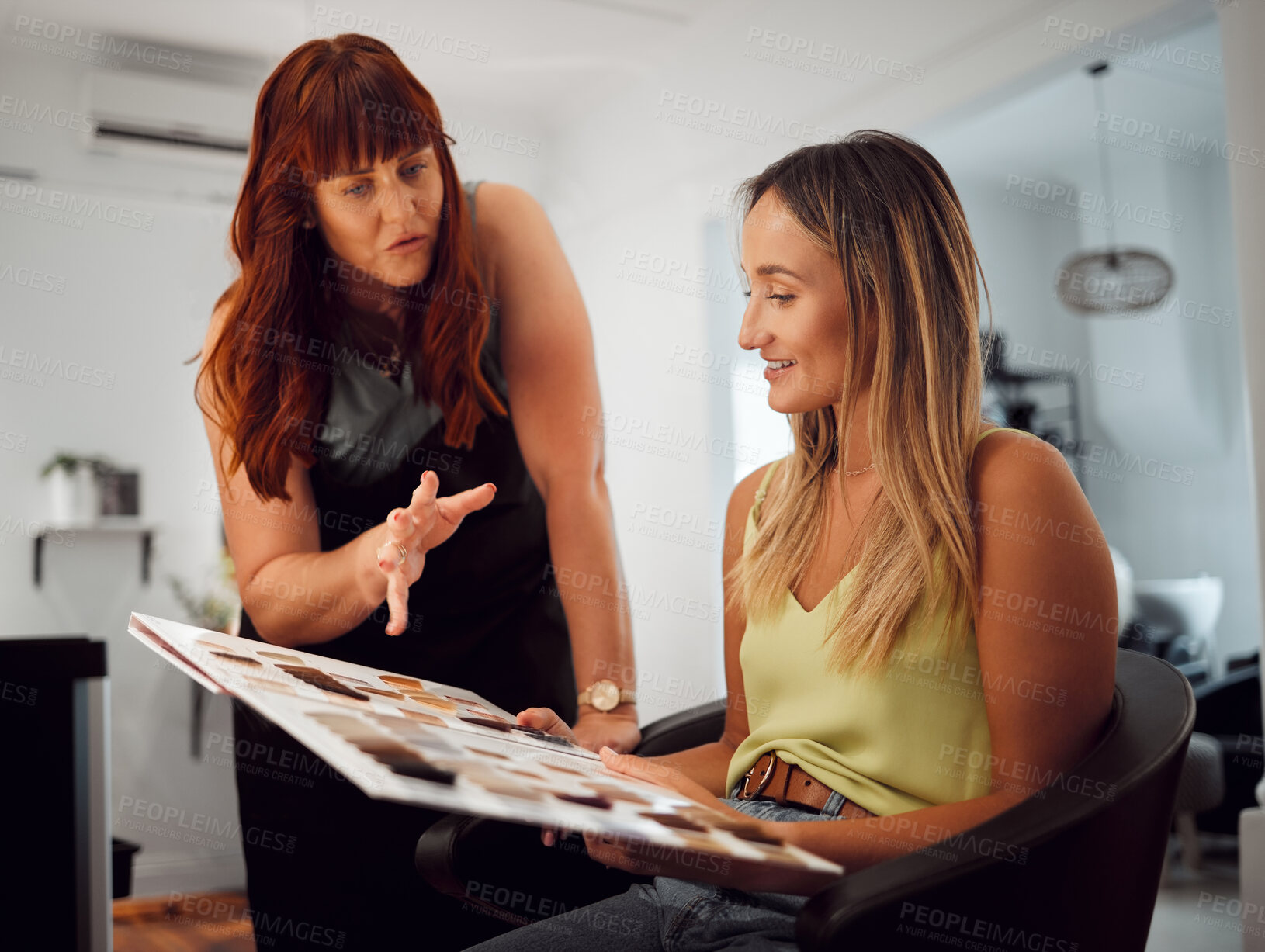 Buy stock photo Salon, hair and and beauty with a woman customer at the hairdresser with a stylist choosing a color. Fashion, studio and client with a young female getting a haircut in a professional boutique