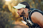 Thinking, focus and outdoor running man challenge, breathing and tired from fitness trail in Australia. Sports athlete nature hiking, training and mental motivation with strong mindset for wellness