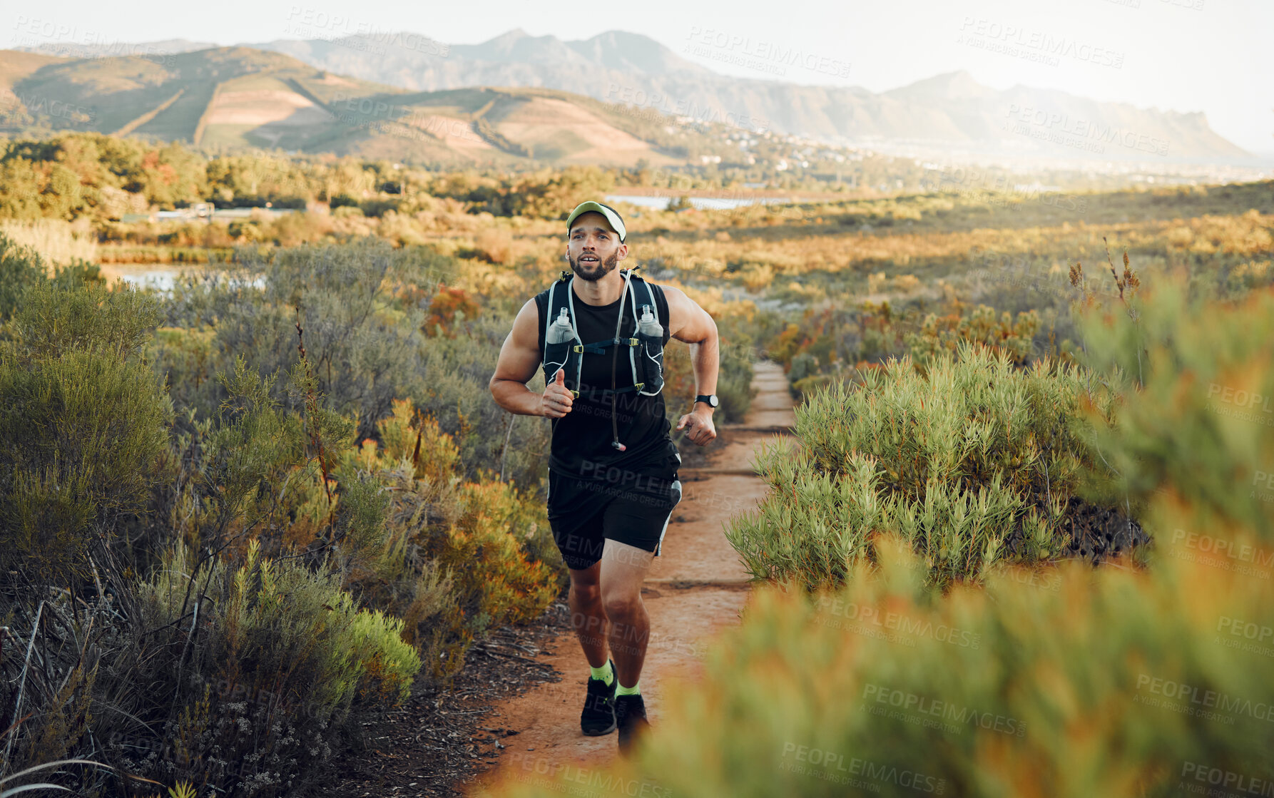 Buy stock photo Runner, fitness or nature workout on mountains path, countryside landscape or sustainability environment. Sports man, athlete or running for health exercise, wellness workout or heart cardio training