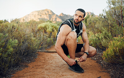 Buy stock photo Fitness, nature and man tie shoes before start of marathon training, exercise or health workout in USA Hollywood Hills. Sports, dirt path and runner ready for peace, freedom or wellness cardio run