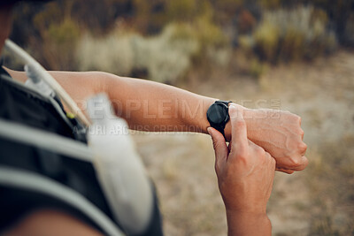 Buy stock photo Man, hiking and nature with smartwatch for time on run, workout or race for sport. Technology, fitness and exercise for training, wellness and health on adventure with tech, gps or clock in Bogota