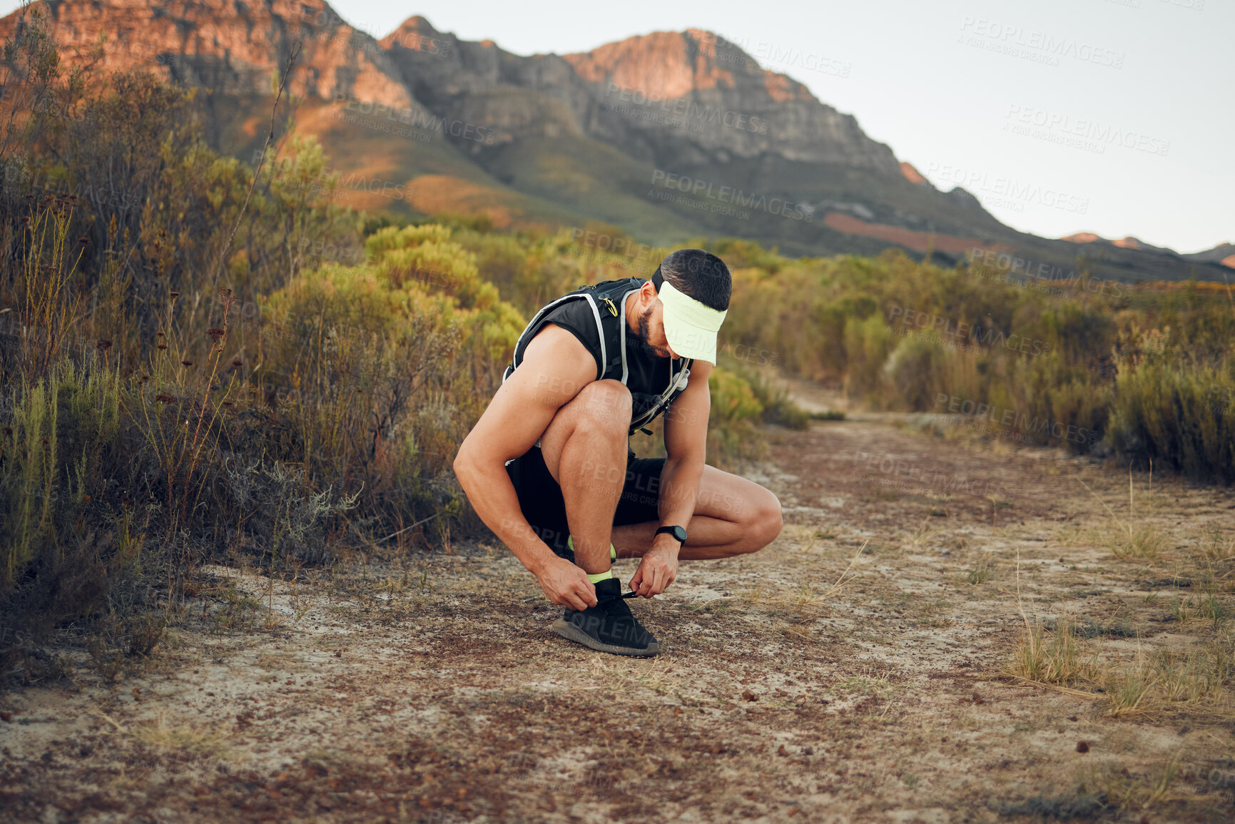 Buy stock photo Man, hiking and shoelace on mountain for workout, fitness and run. Shoes, sneakers and male training for sports and health on adventure in summer with wellness, nature and running in Australia