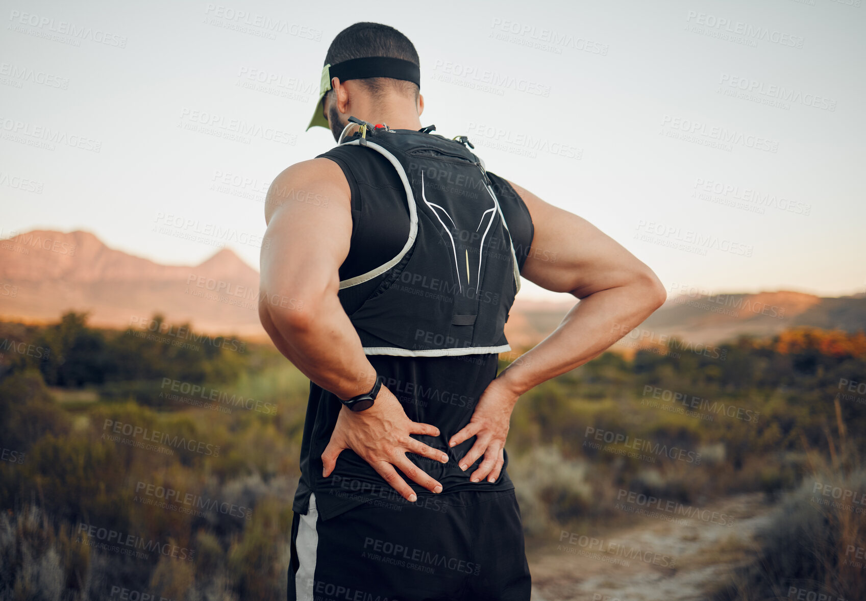 Buy stock photo Muscle, injury and back pain after a workout or running outdoor. Man holding lower back muscles in pain after exercise, hike and run. Accident, hurt and physical strain for backache during exercise