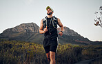 Fitness man running exercises alone in nature outdoor on a sunny day. Muscular male runner with sportswear run with speed, endurance and cardio with strength training, hike or workout during sunset