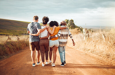 Buy stock photo Hug, friends and walking with back view in countryside for group holiday bonding moment together. Support, care and love in friendship with people enjoying South Africa dirt road  walk on vacation.