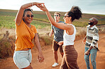 Dance, singing and friends walking in nature on holiday in the countryside of Kenya together in summer. Happy, relax and dancing people being playful on a vacation in the countryside to relax