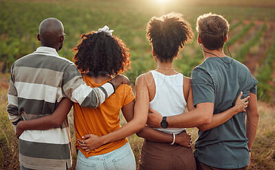 Buy stock photo Diversity, view and friends together hug, friendship and love on a countryside farm in France. People relax, back and summer people on holiday vacation in nature, vineyard or outdoor during sunset