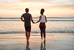 Sunset, beach and couple walking holding hands in ocean for outdoor holiday, date or summer vacation with horizon, sky mock up. Love, care and support people running, bonding by the sea for wellness