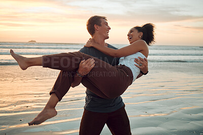 Buy stock photo Man at beach lift woman with love, smile with sunset on travel holiday in Hawaii. Young couple travel to ocean on vacation, happy and play together with sunset at sea or waves in nature during summer