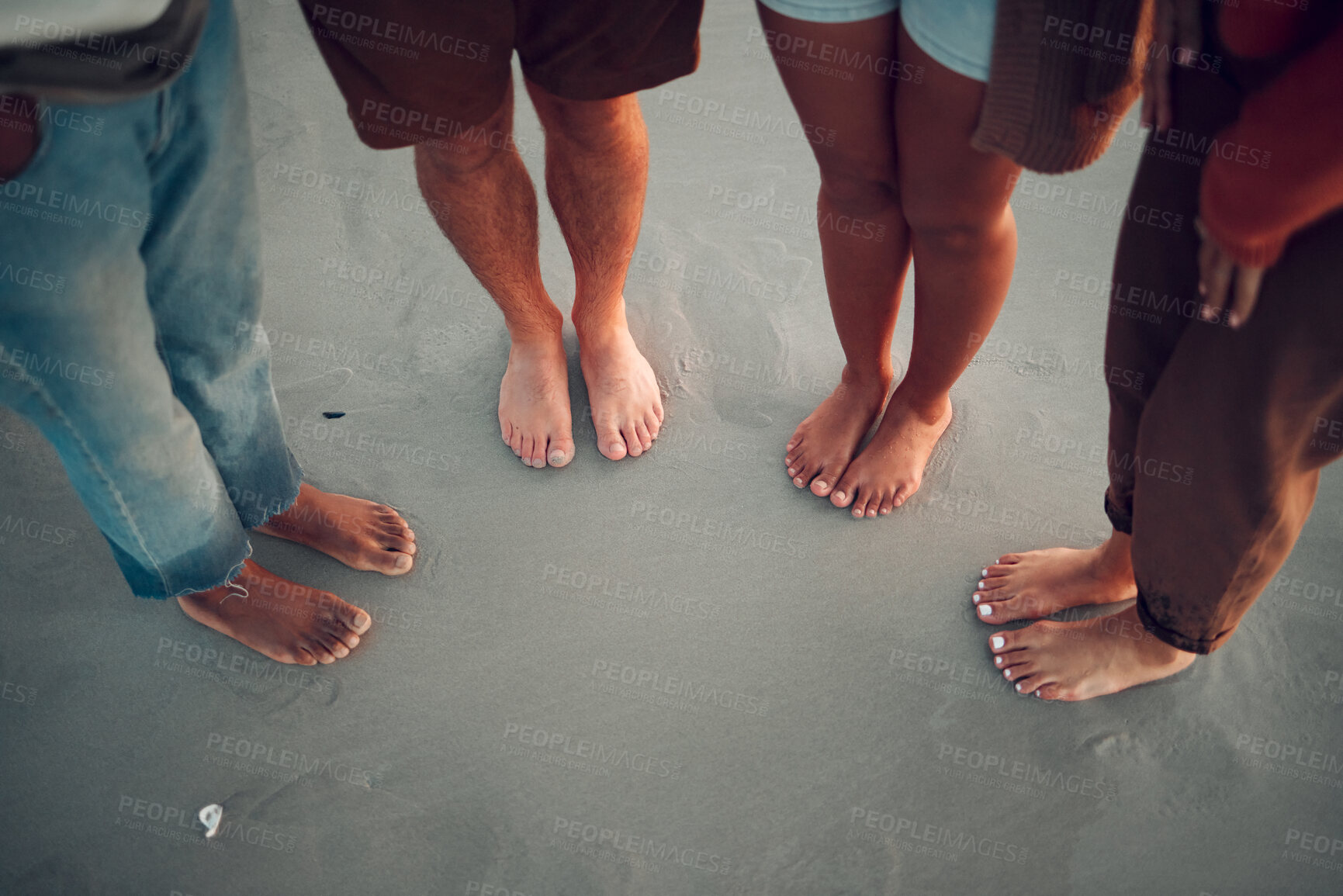 Buy stock photo Friends, feet and beach in water, sand and travel summer vacation with diversity, men and women. People group relax on tropical sea holiday with wet toes together while traveling, friendship and trip