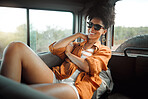 Happy, relax and woman in a caravan on a road trip, journey or vacation alone in summer in the countryside. Travel, nature and girl from Brazil with smile relaxing in a van while on holiday adventure