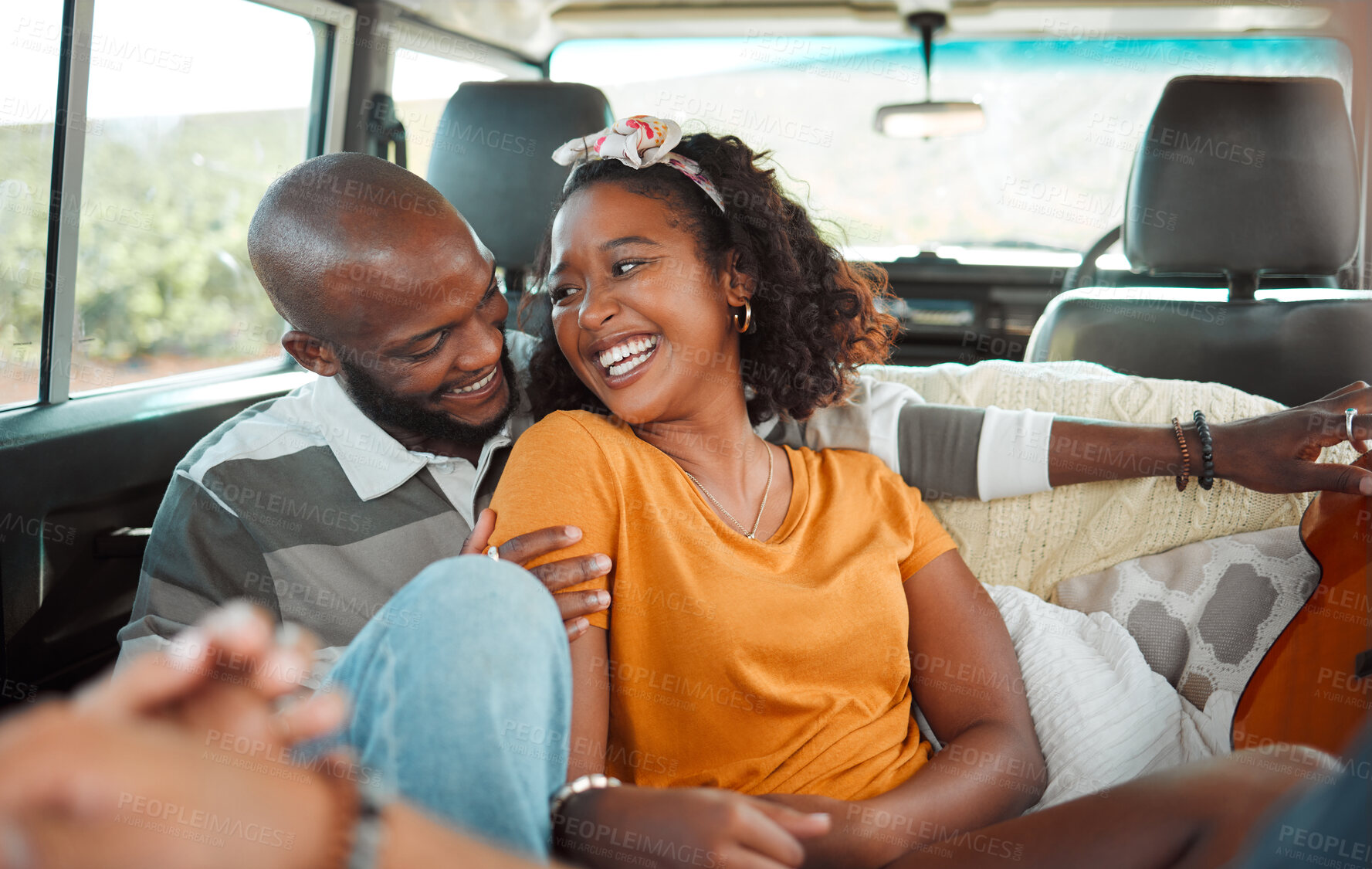 Buy stock photo Love, travel and couple on a road trip, talking, laughing and bonding in a car together. Happy, adventure and black woman smiling and relax with cheerful man, having fun, sharing joke and enjoy trip