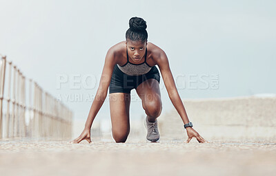 Buy stock photo Fitness, runner and woman start running workout along beach, cardio and speed training. Sports, exercise and portrait of black woman prepare for marathon with morning run, serious, focus and intense
