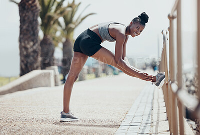Buy stock photo Black woman, stretching and exercise for run, workout and fitness outdoor in street in sunshine. Girl, happy and runner warmup to start training for race, marathon or competition in Cape Town