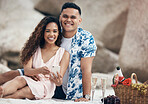 Couple, phone and beach picnic date with champagne, food basket and fruit for anniversary celebration, valentines day or love bonding. Portrait, smile or happy woman with relax man and 5g mobile tech