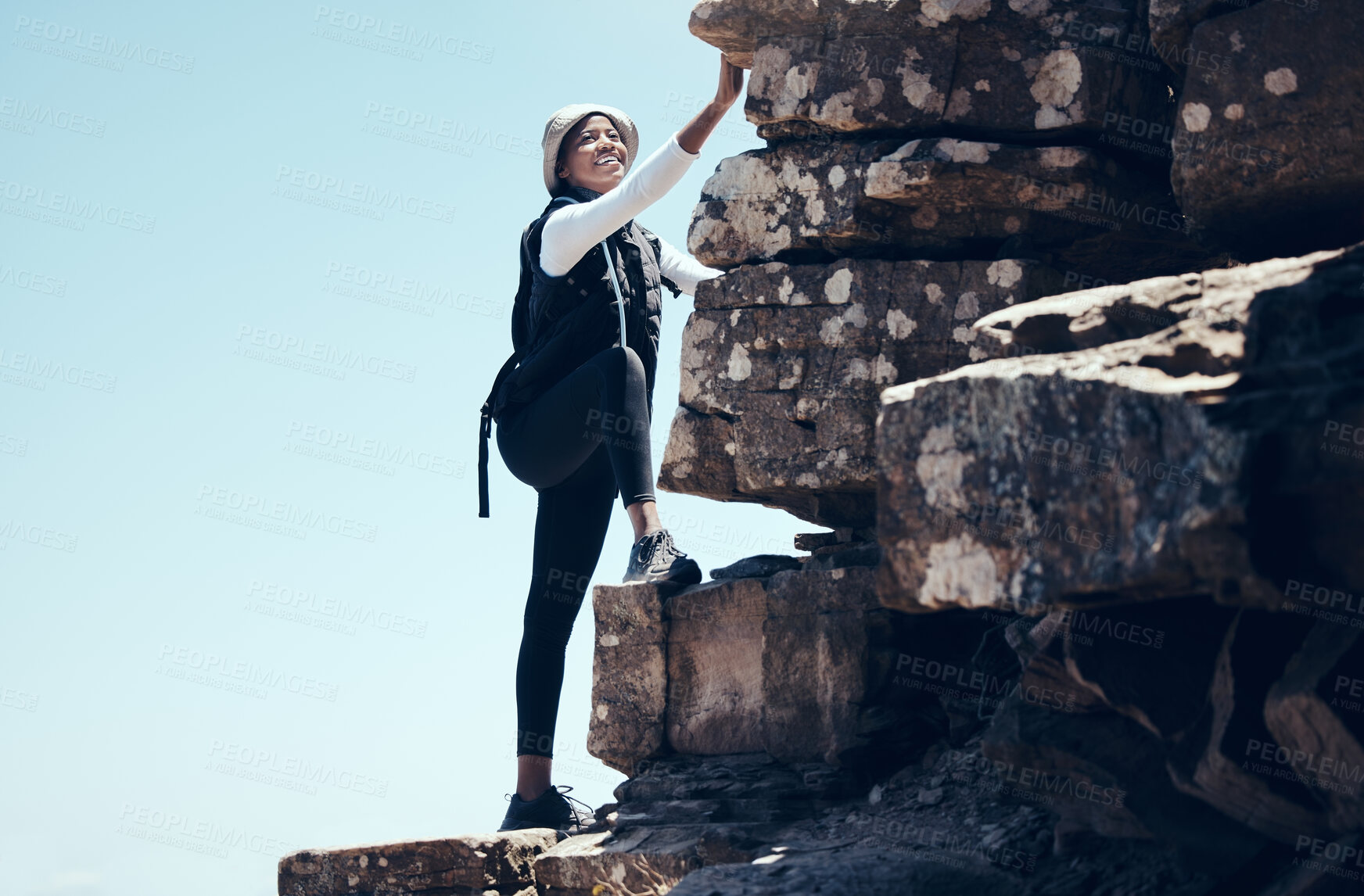 Buy stock photo Fitness, mountain and woman rock climbing in nature, smile, relax and happy on morning workout. Sport, adrenaline and exercise with black woman enjoying an adventure, climbing and looking proud