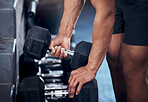 Closeup of man, workout and hands weightlifting with dumbbell in gym for health, fitness and muscle development. Strong, bodybuilder and exercise for sports, wellness and motivation in training club