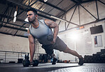 Man fitness dumbbell training, health workout and lifestyle or sport wellness motivation. Focused health athlete, fit active lifestyle and muscle build strength technique with gym exercise equipment