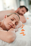 Relax, spa and couple in luxury massage for health, wellness and therapy treatment at a resort indoors. Man and woman resting head on massaging table to enjoy a calm day of zen, care and relaxation