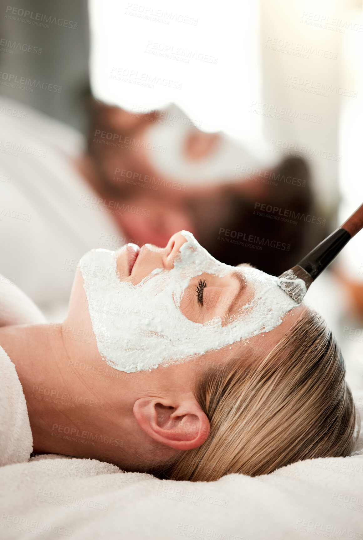 Buy stock photo Facial, skincare and couple are calm at spa for wellness, body health, serenity and zen. Love, relax together and face treatment, eyes closed and relief of stress at beauty salon while on vacation. 