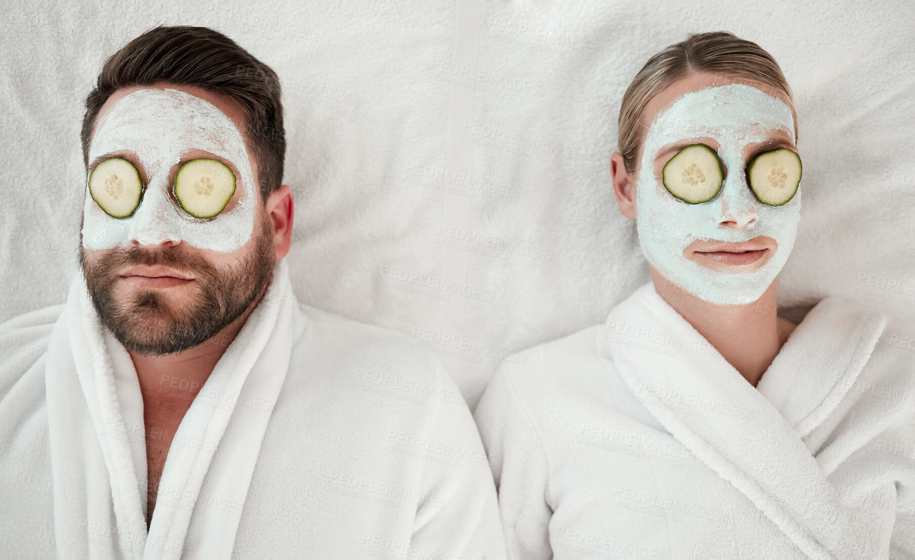 Buy stock photo Love, relax and couple at spa with face mask for luxury wellness treatment together from above. Professional skincare facial for self care detox and relaxation on cosmetic salon bed in Canada.


