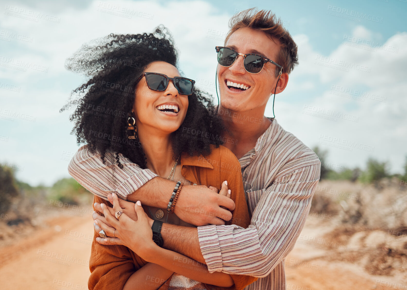 Buy stock photo Couple, happy and smile hug in nature on a travel, adventure and road trip outdoor. Happiness of traveling girlfriend and boyfriend together in the summer sun with quality holiday time in the dessert