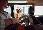Dance, van and music with woman dancing and bonding with man in a rv, relax, happy and hipster lifestyle. Freedom, love and couple travel in nature, stop to enjoy the view and guitar celebration