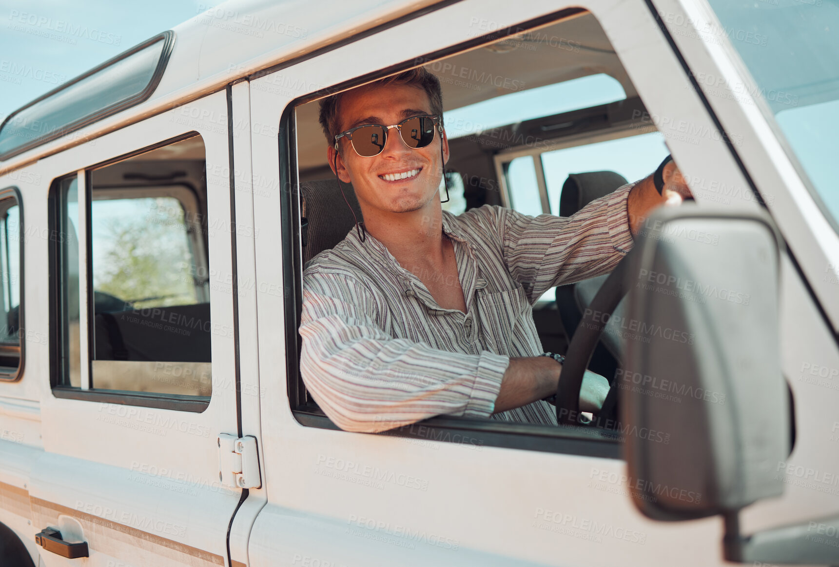 Buy stock photo Travel, driving and adventure man in a caravan for outdoor nature journey, holiday in summer or vacation with sunglasses portrait. Young man in a van or car transport for a drive in countryside life