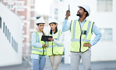 Buy stock photo Communication, construction and architect worker talking on tech about building project in the city of Canada. African engineer speaking about architecture on walkie talkie with team on a tablet