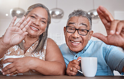 Buy stock photo Senior couple, coffee and wave for video call smiling, talking or speaking at home. Elderly man and woman greeting on social media or face time while enjoying a warm beverage indoors