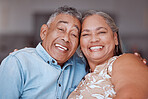 Happy senior couple, portrait smile and relationship bonding together in joyful happiness at home. Man and woman smiling for retirement in love and care for romantic family relax time at the house 