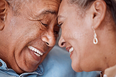 Buy stock photo Love, couple and face of senior man and woman embracing and laughing, relax and bonding in their living room. Rest, happiness and retirement by caring soulmate share sweet moment, enjoy relationship