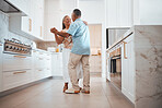 Couple, elderly and dance in kitchen for love, romance and happy together while home in retirement. Senior, man and woman dancing on floor in house for bonding, happiness and care with smile on face