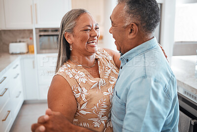 Buy stock photo Senior couple dance in kitchen with celebration for retirement, real estate or happy marriage. Elderly pension people dancing to music with love, care and wellness in their house or home together